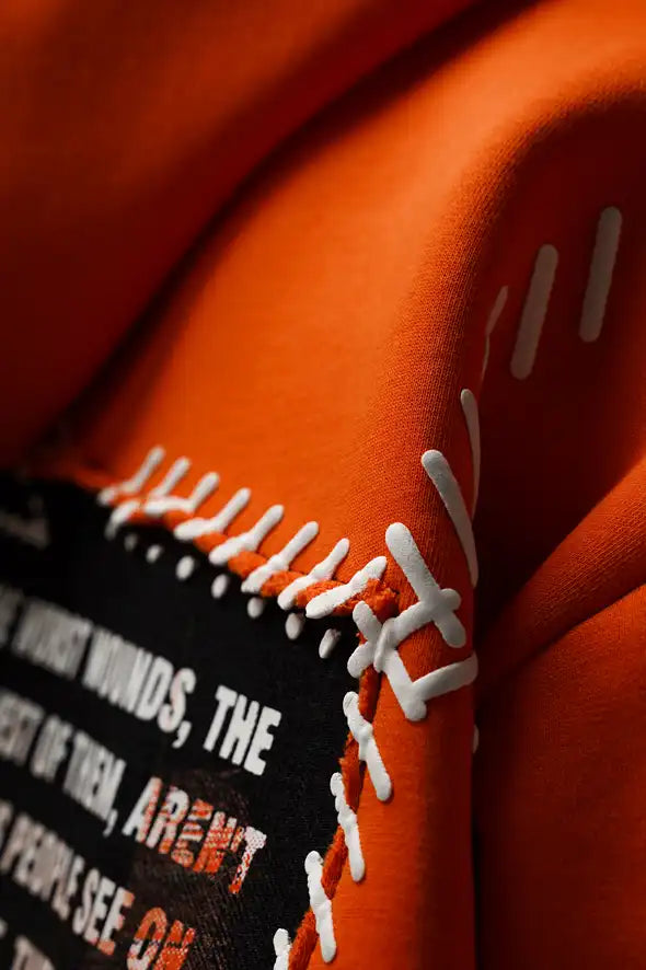 WOUNDS WITHIN ORANGE HOODIE